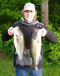 Curt Snow with two of the bass from a winning bag of 19.81 lbs.